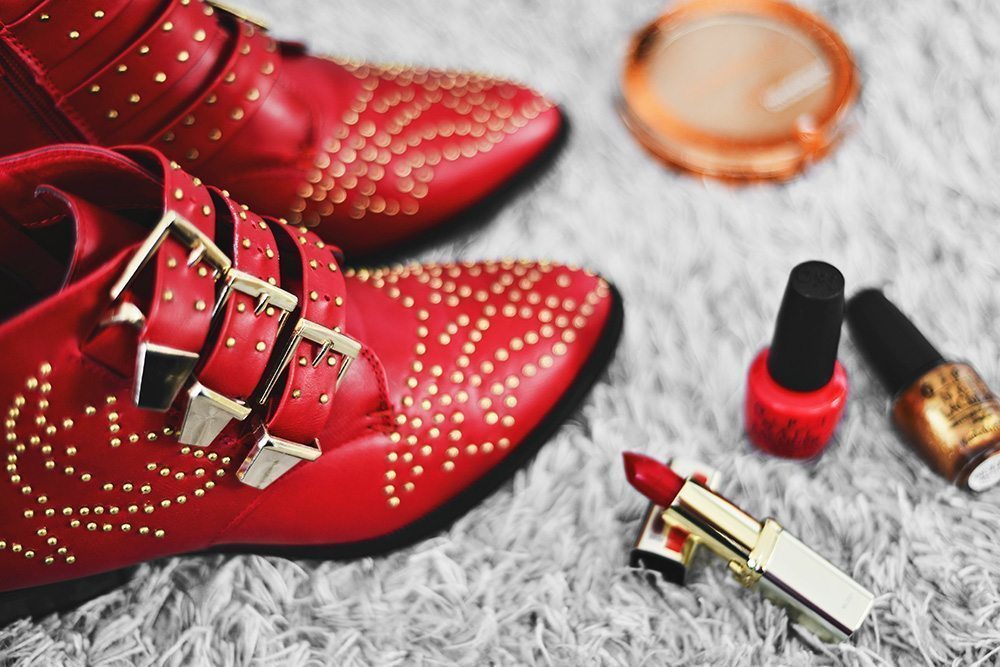 Red studded ankle boots