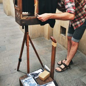 Gatufotograf i Gamla Stan