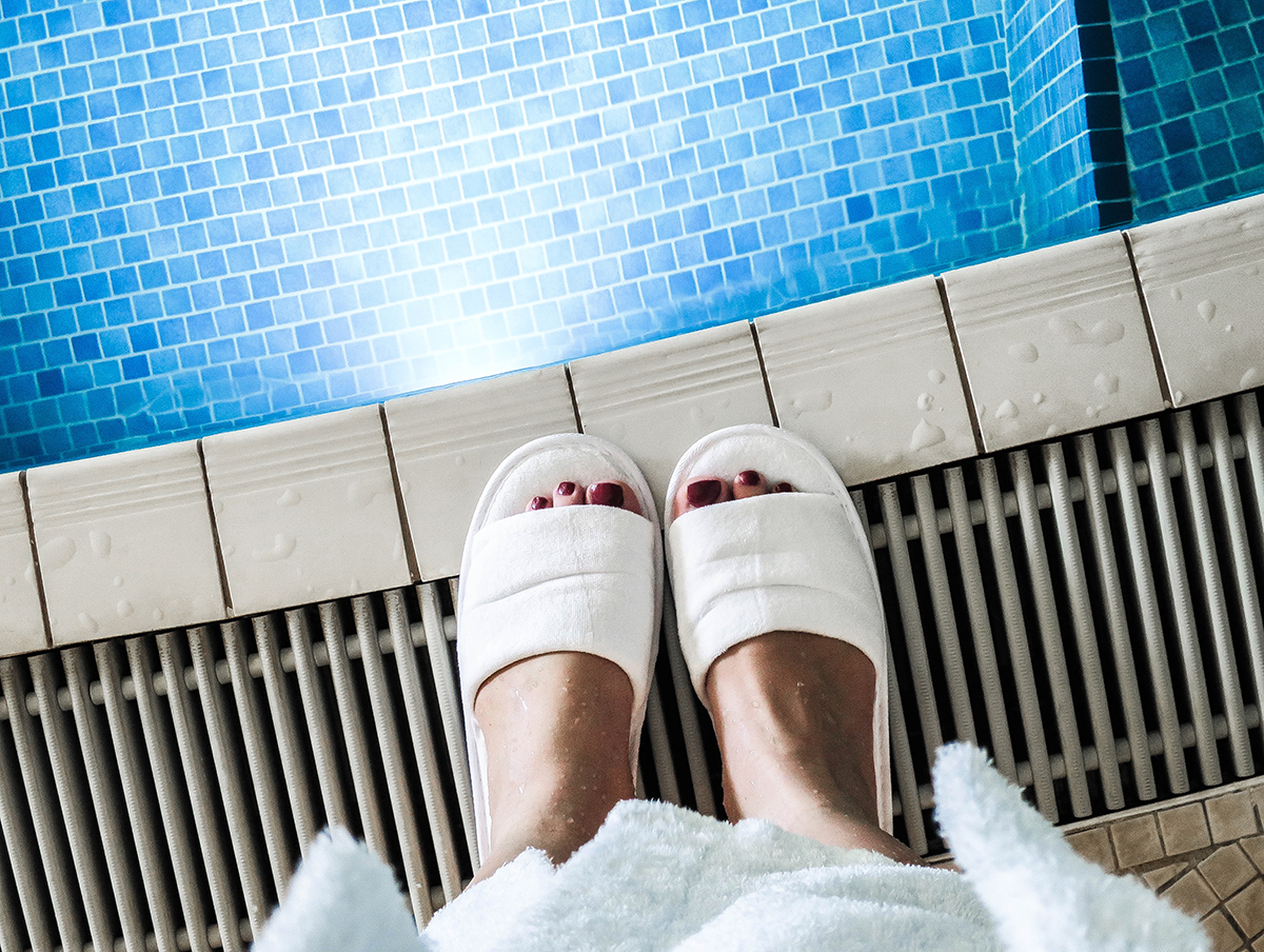 Feet by the pool