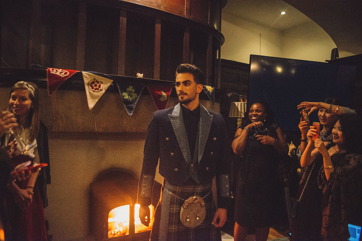 Siobhan Mackenzie Scottish Fashion Show with hot male model wearing kilt