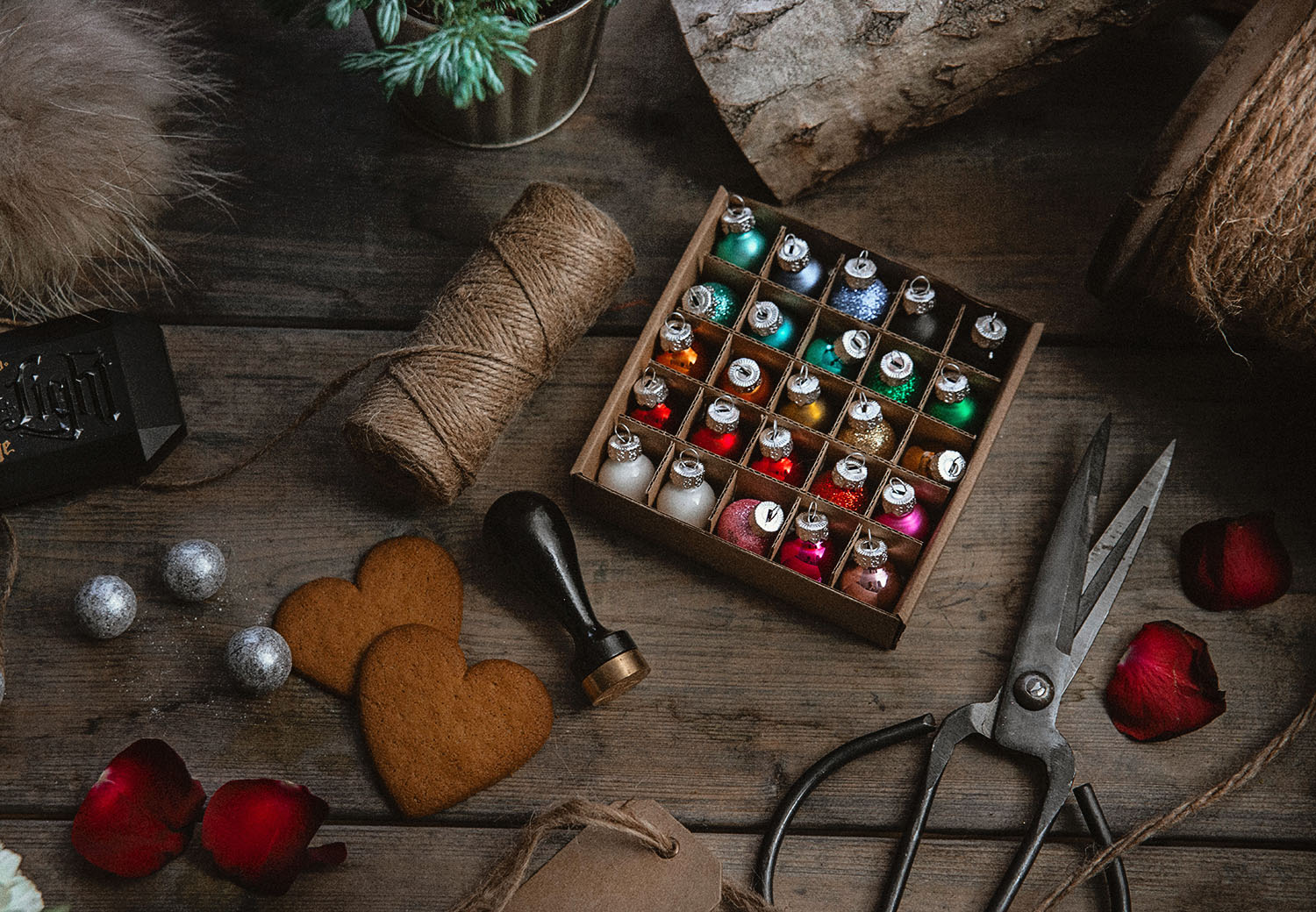 Christmas Decorations and flatlay on dark wood