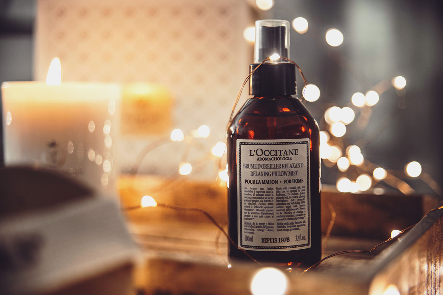 L'OCCITANE Relaxing Pillow Mist & Bokeh background