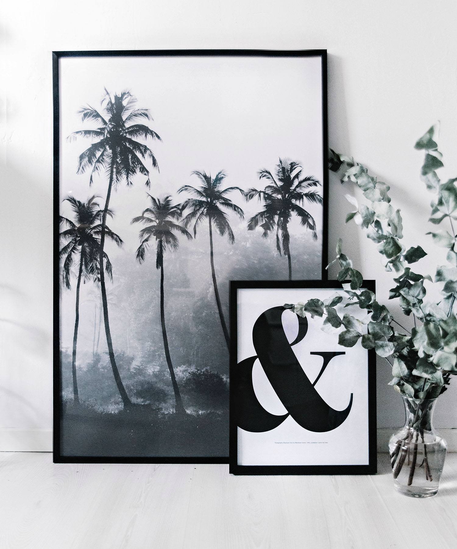 Palm trees and & letter posters on floor