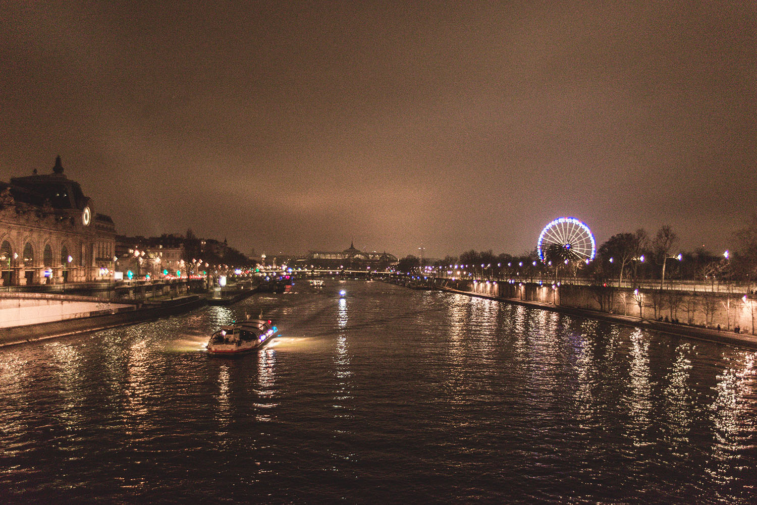 Paris by night. View from Pont Royal Bridge