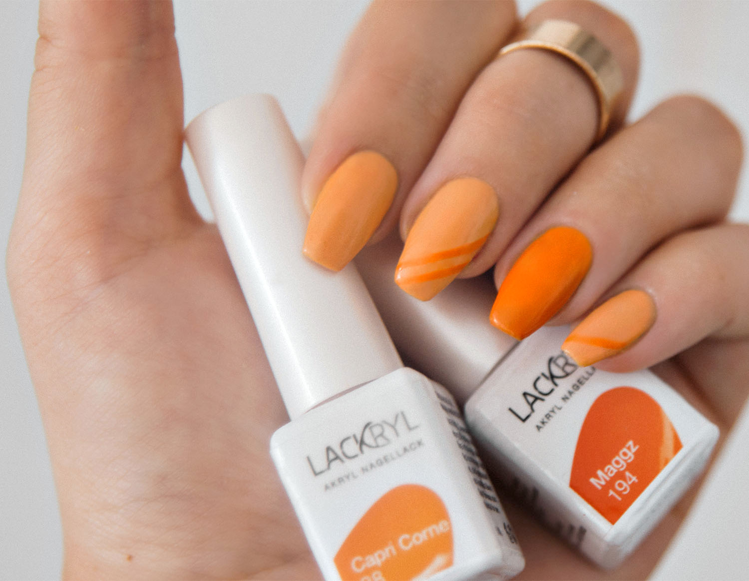 Lackryl Capri Corne & Maggz - Orange Nail Design