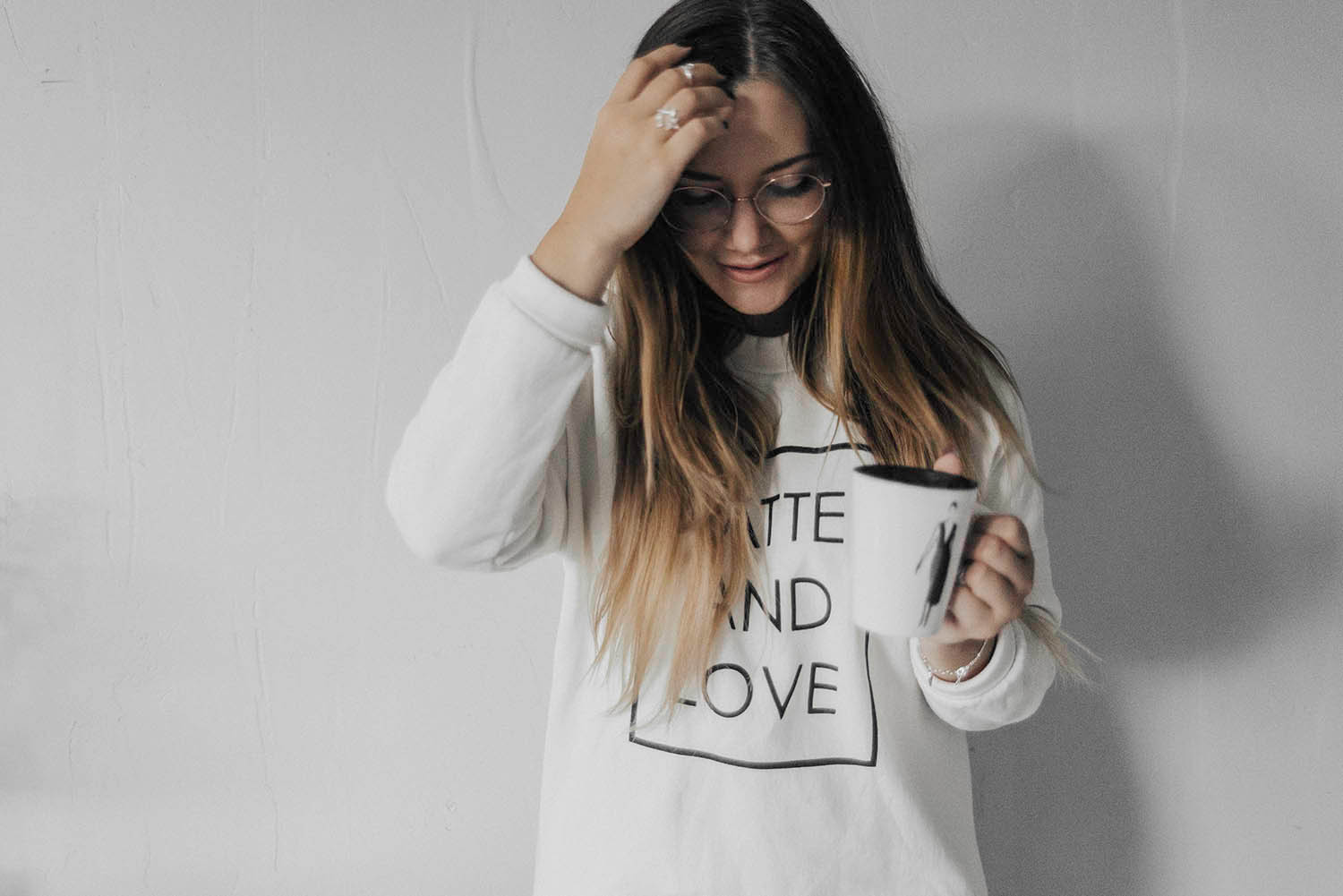 Latte and Love - Girl with glasses holding coffee cup