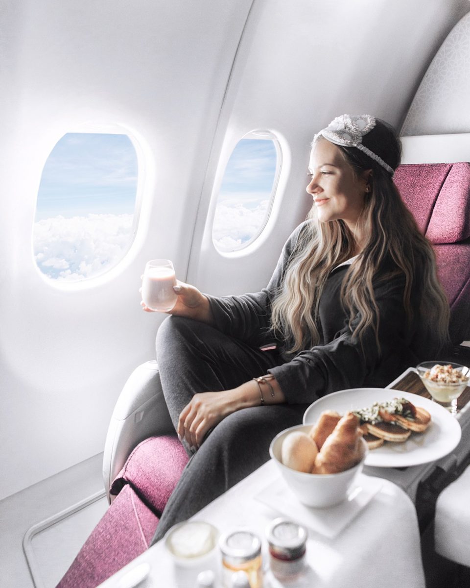 Carry-On Essentials for Long-Haul Flights / Girl in Qatar Airlines Business Class