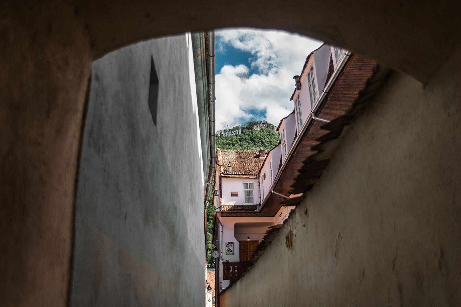 Strada Sforii, one of the narrowest street in the city of Brașov, Romania