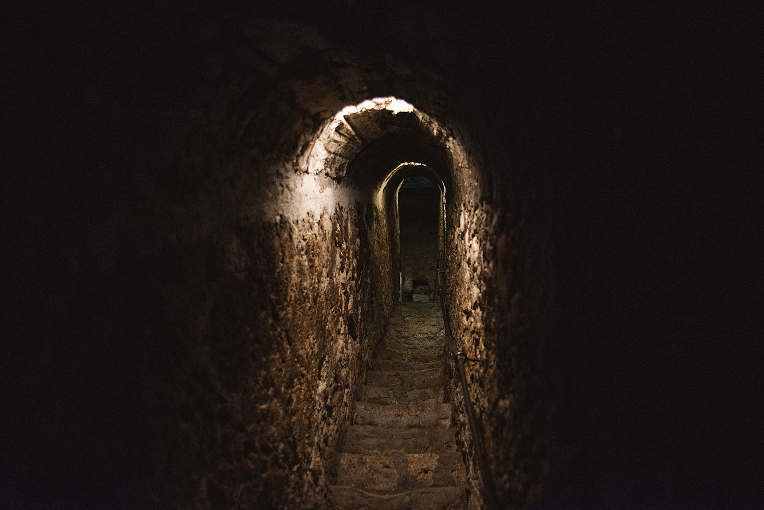 Dark tunnel inside Bran Castle in Transylvania