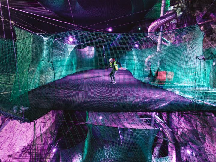 Man bouncing in Bounce Below - Underground Trampolines in North Wales