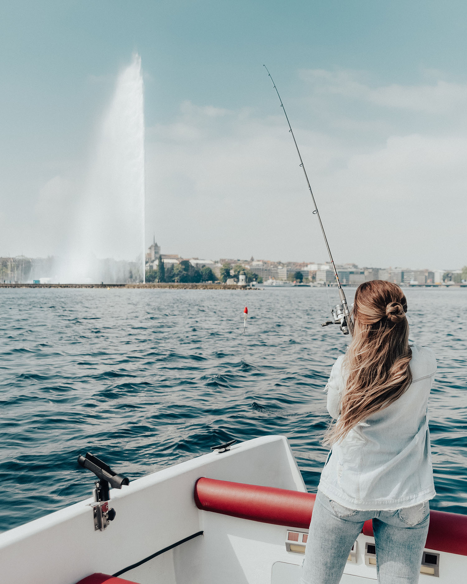 Adaras on a fishing boat trip on Lake Geneva - Jet d'eau in the background